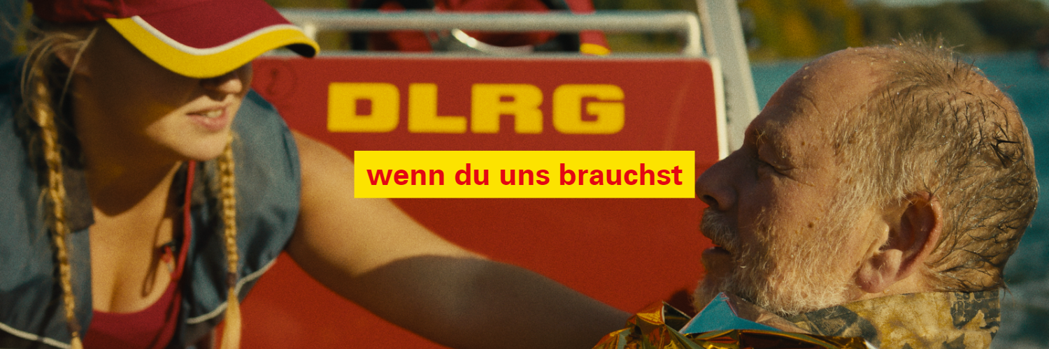 Fotostory Teil 4: Ehrenamtliche aus der DLRG kümmert sich um den Geretteten. Text: wenn du uns brauchst